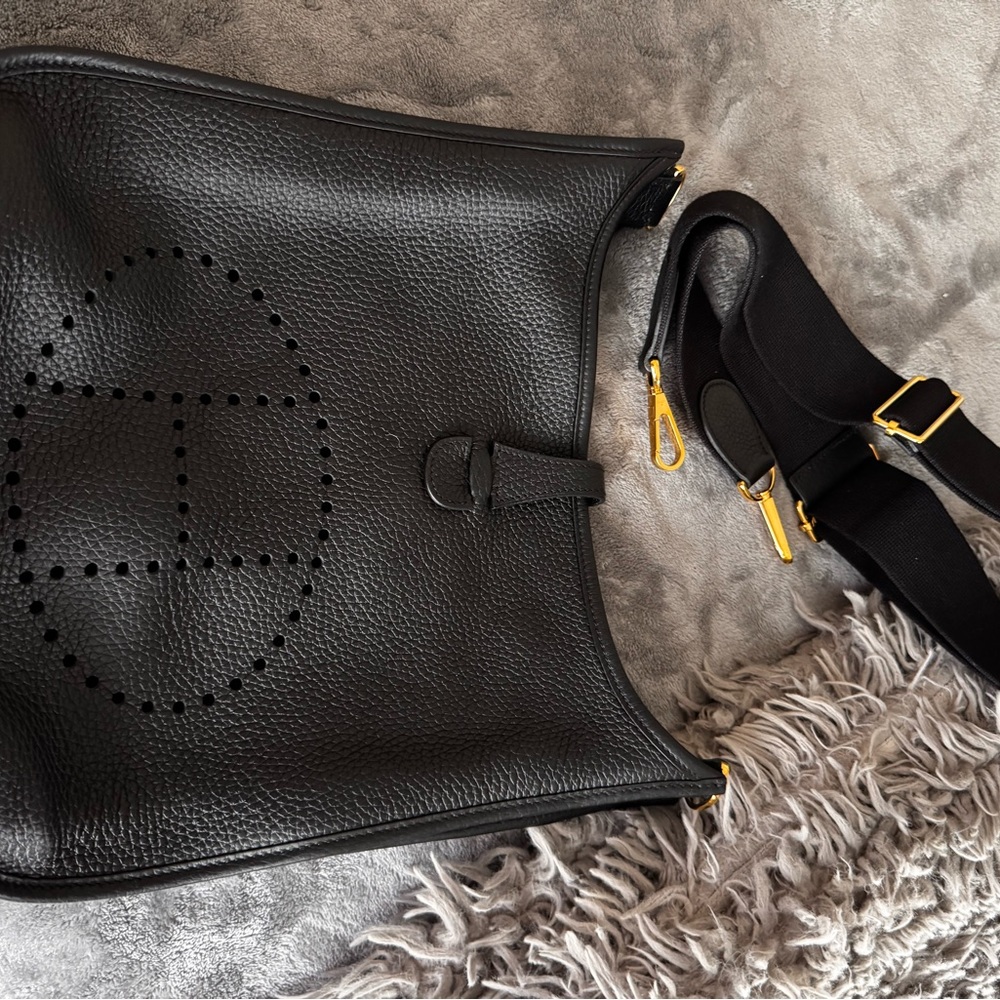 Hermes Black Backpack with Gold Accents